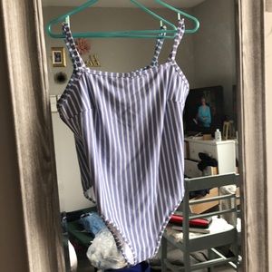 Never been worn— one piece swim suit